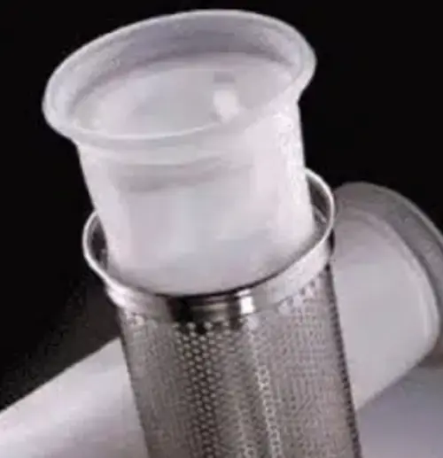 Open industrial bag filtration system housing showing a filter bag and stainless steel support basket.