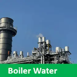 Industrial boiler system with a prominent exhaust pipe and a steam pipe showing slight vapor