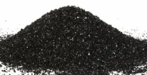 Premium activated carbon filter media granules for industrial water purification systems.