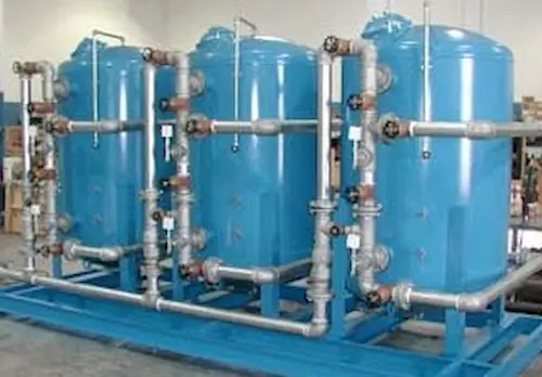 Drinking water filtration system with three tanks