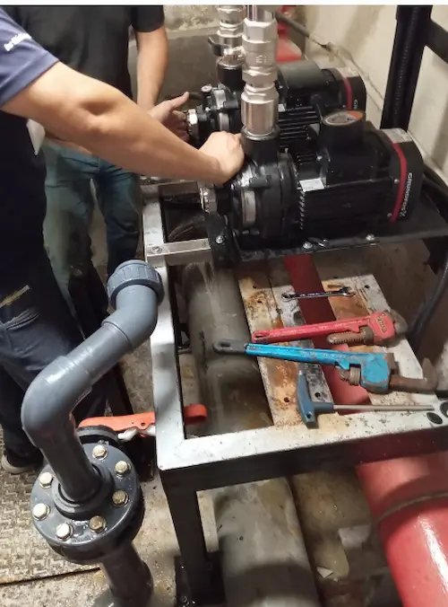 Technicians are repairing water treatment system