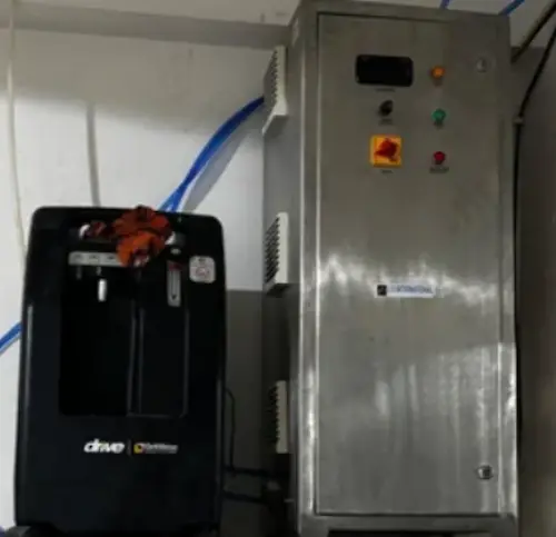 Compact ozonation system installation featuring an integrated ozone generator, contact chamber, and control panel for water treatment.