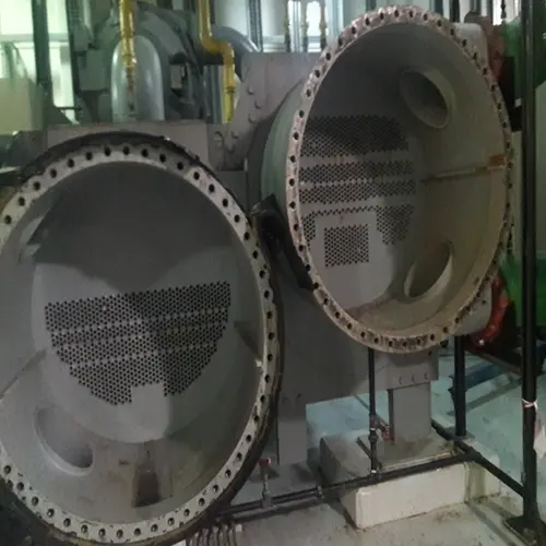 HVAC chiller condenser and evaporator barrels opened up for a chemical cleaning maintenance process.