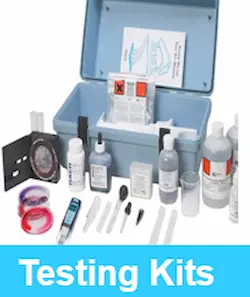 Full-size water testing kit completely open to display all laboratory apparatus, color comparators, and chemical reagents